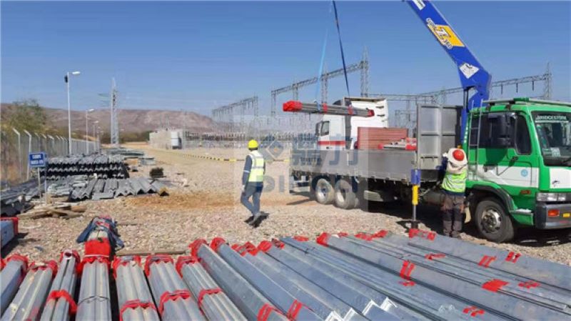 Overhead Line Lattice Steel Towers: Unloading at Site For Installation 