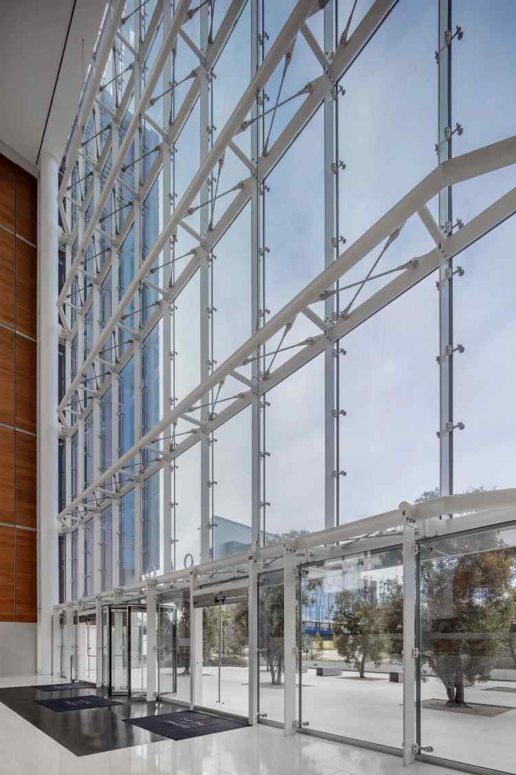 Glass and Steel Atrium Walls with Steel Bow Trusses | Architecturally Exposed Steel