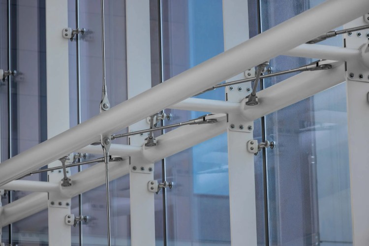 Glass and Steel Atrium Walls with Steel Bow Trusses | Architecturally Exposed Steel