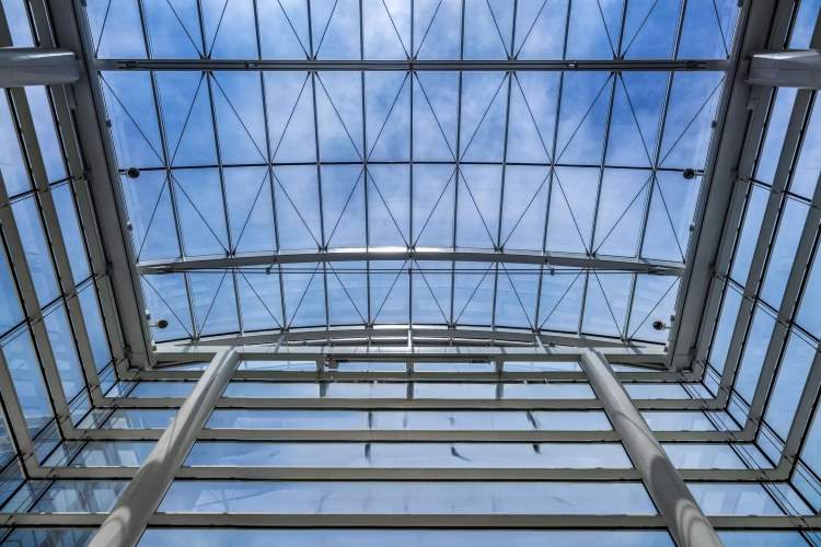 Tension Cable Edge Clamped Glass Atrium structure | Architecturally Exposed Steel